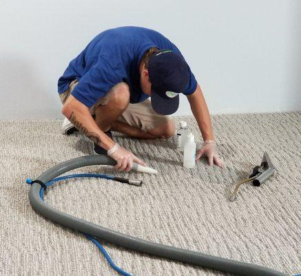 Chris removing an ink stain.