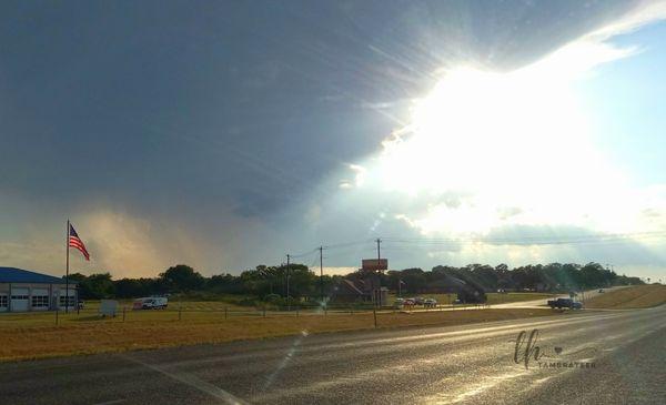 Cliff's Auto Repair on 199 Springtown, TX where Miss Old Glory faithfully greats her public.
