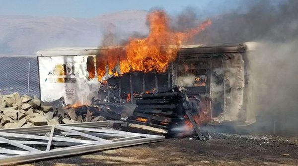 Car trailer after wildfires in Morgan Hill. A fire break would have prevented over $97,000 of damage caused to our property.