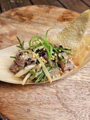 2023 poke fest 2nd place poke winner creation was a :Yuzu umami ahi poke".