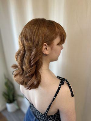 Soft curls pulled back