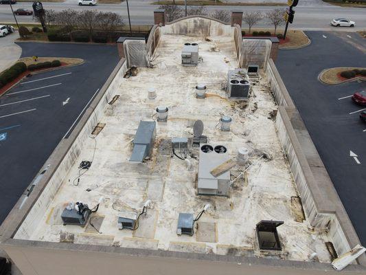 Before we pressure washed the Bojangles roof this was how it looked