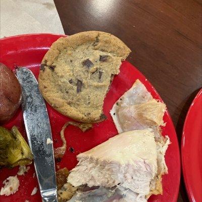 Montreal rotisserie roasted chicken, home fresh baked cookie, Caribbean seasoned chicken