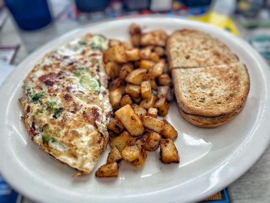 Egg White Omelette w/ bacon, broccoli & onion. Delicious!!