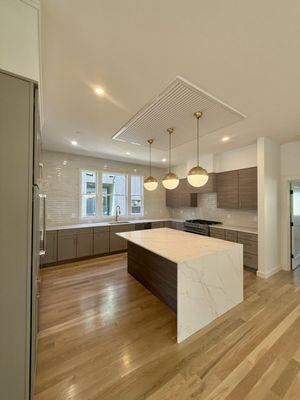 Luxury kitchen upgrade in Brookline. Built-in appliances, sleek design, free estimates.