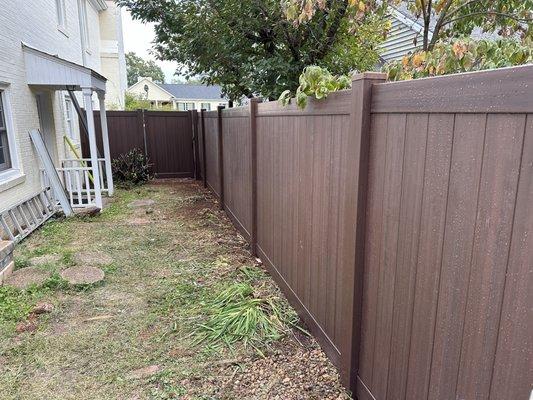 Dark walnut vinyl fence