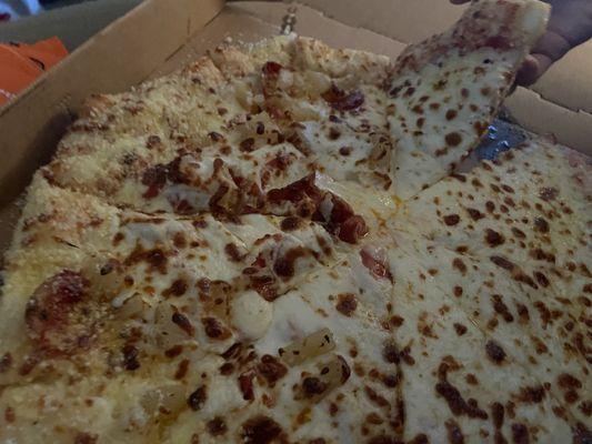 Cheese crazy crust- extra cheese - half old world pepperonis and half pineapple- well done. This doesnt look well done.