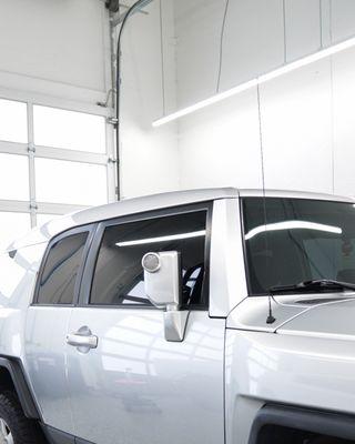 Toyota FJ Cruiser in for a new look! Getting the roof wrapped in gloss white aluminum!
