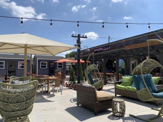 More patio sitting area and front of main coffee house