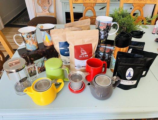 Yummy...Locally roasted coffee and organic teas along with infuser tea pots, cups, French press, and art mugs.
