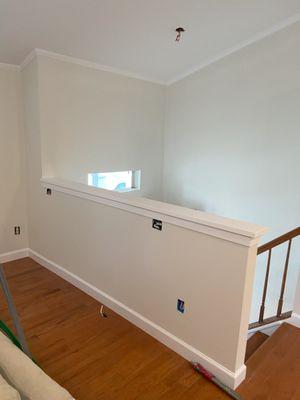 Half wall that Platinum installed to ensure the safety of our growing family! They had the great idea of installing outlets with USB's!