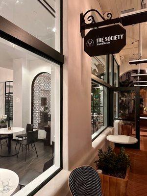 The Society signage with outdoor patio