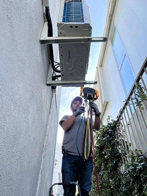 Comprehensive air conditioning maintenance in progress! Our expert team ensures your system smoothly, efficiently, and reliably year-round