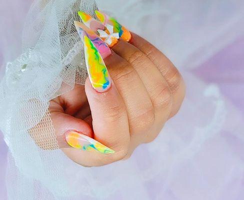 Color Splash Delight!
Bright, bold, and beautifully abstract! Make a statement with these vibrant, colorful nails. Book your spot now!