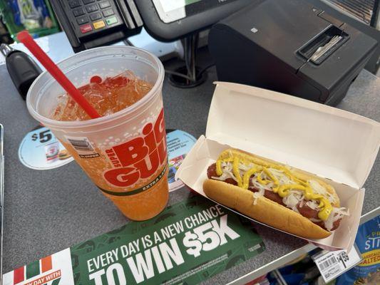 Big Bite Glizzie and a Jarrito's Mandarin Orange Big Gulp