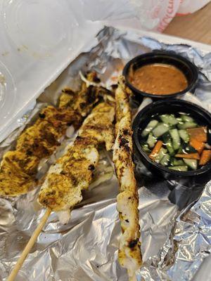 Chicken satay (take out). Thinner than most chicken satay I get. Pricey for $9.
