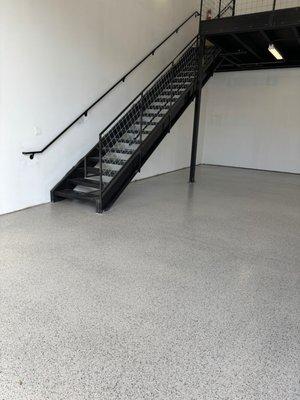 Flake epoxy gives your garage a durable, slip-resistant, and stylish finish that's easy to clean and built to last.
