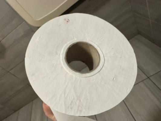 Needle marks in the toilet paper roll