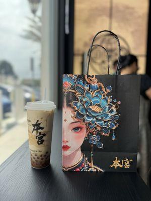 Jasmine boba milk tea and takeaway bag