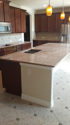 Our new granite (giallo santos with a beveled edge).