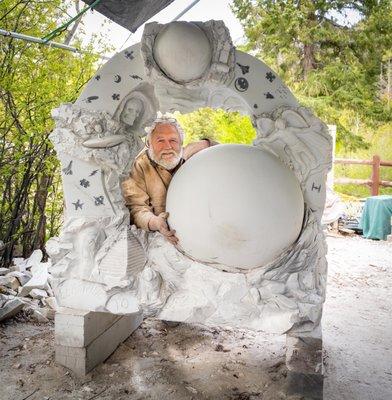 Artist Rex Branson, with his work of art about flight, as explained to me by his fellow artist wife, Vickie