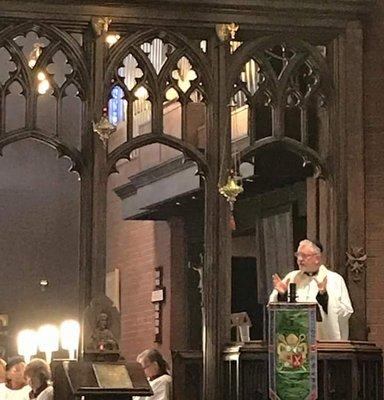 Fr. Charles preaching.