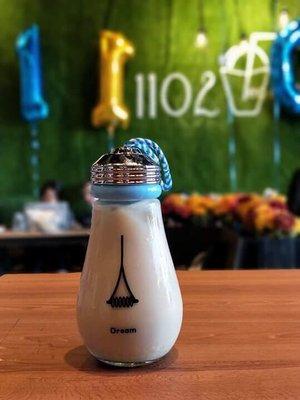 Hojicha milk tea in a glass bottle (you get to keep)