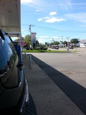 Mobile gas sign on the corner of Genesee St and Union St.