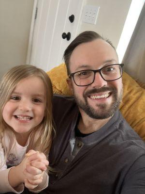 Me and my daughter with my new haircut.