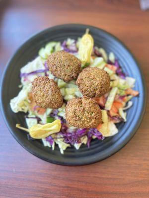 Falafel over salad