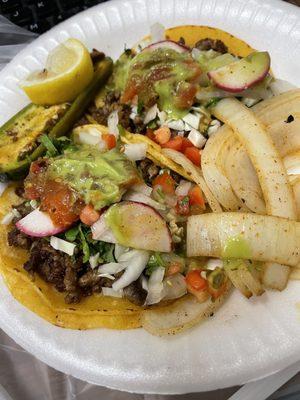 Carne Asada Tacos with grilled onions and jalapeño