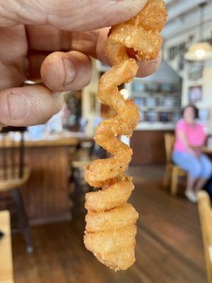 Curly fries: the bedsprings of fried potatoes