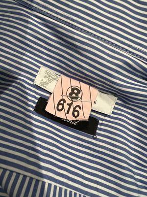 Who staples into the actual shirt label? They do!