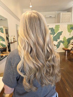 Layered haircut with curls.