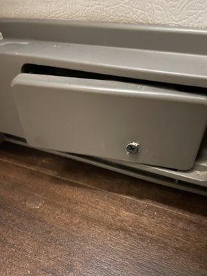 Our fridge filter latch was broken and this is how they fixed it... just put a screw through it and called it a day.