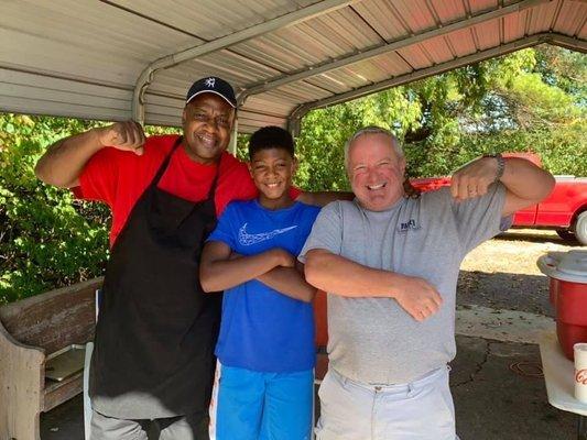 Waiting on smoked wings and ribs thats being cooked on site. Summer lunches!