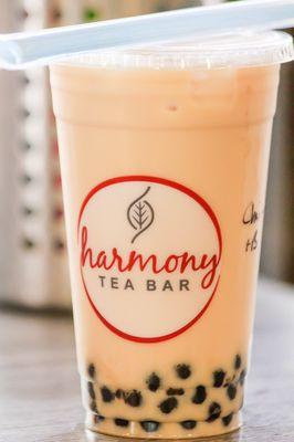Our house speciality: all-natural Thai Tea with honey boba.