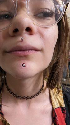 Medusa piercing and chin dermal