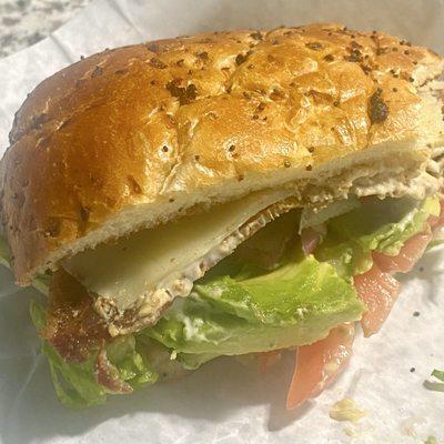 Weak-ass BLT with two pieces of bacon on a nice onion rol