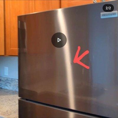 The "DENT" in question that caused the door to be replaced