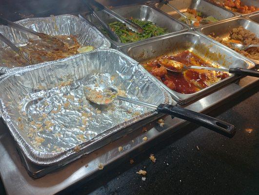 Empty rice, empty lomein, almost empty chicken