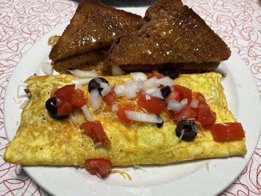 Mexican Omelet Hash browns under the toast