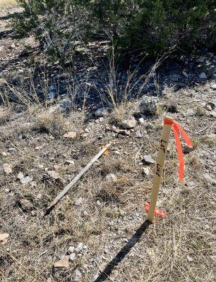 Property stake removed by the builder thrown on the ground and replaced. We had to get another survey down and we had him mark ever 30ft.