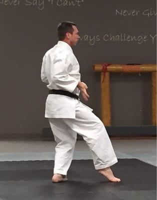 Sensei Randy demonstrating kata to a mid-level class.
