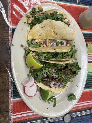 Various tacos on a plate.