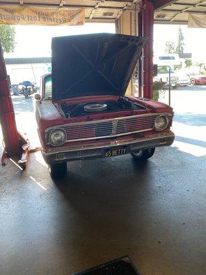 A classic car in the shop