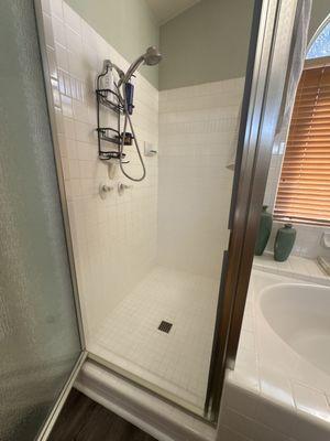 Re-tiled halfway up a stand up shower