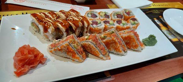 Top left angel roll, top right Port Charlotte roll, bottom triangles spicy tuna sandwich