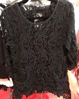 Gorgeous Lace Tunic is available in Black or White. Tank underneath is included. All sizes available.