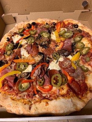 Ok, I'm not quite sure how they do it every time I get some thing from Sliced they amaze me! The Pilin' It High pizza. Sooooo good.